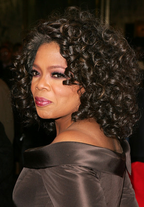 oprah hairstyle. The other day some of you all convinced me that Oprah has had banging hair for years! Of course, Iwasn't buying it so I did a little research and her hair 